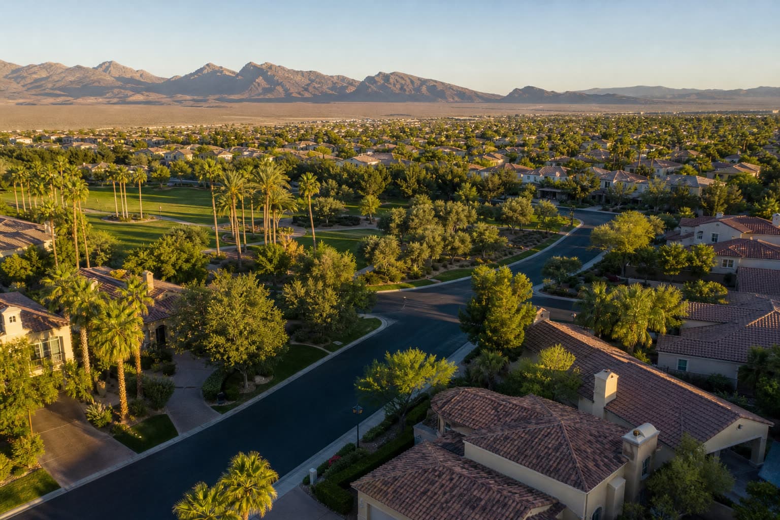Master-planned Las Vegas streets with parks and tiled-roof homes